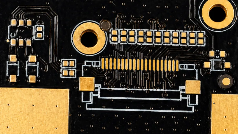 Mentor PADS PCB layout with fine signal routing, component pads, plated vias, and gold connector contacts