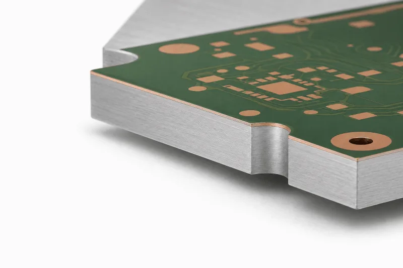 Bare aluminum core PCB with copper pads and brushed metal base