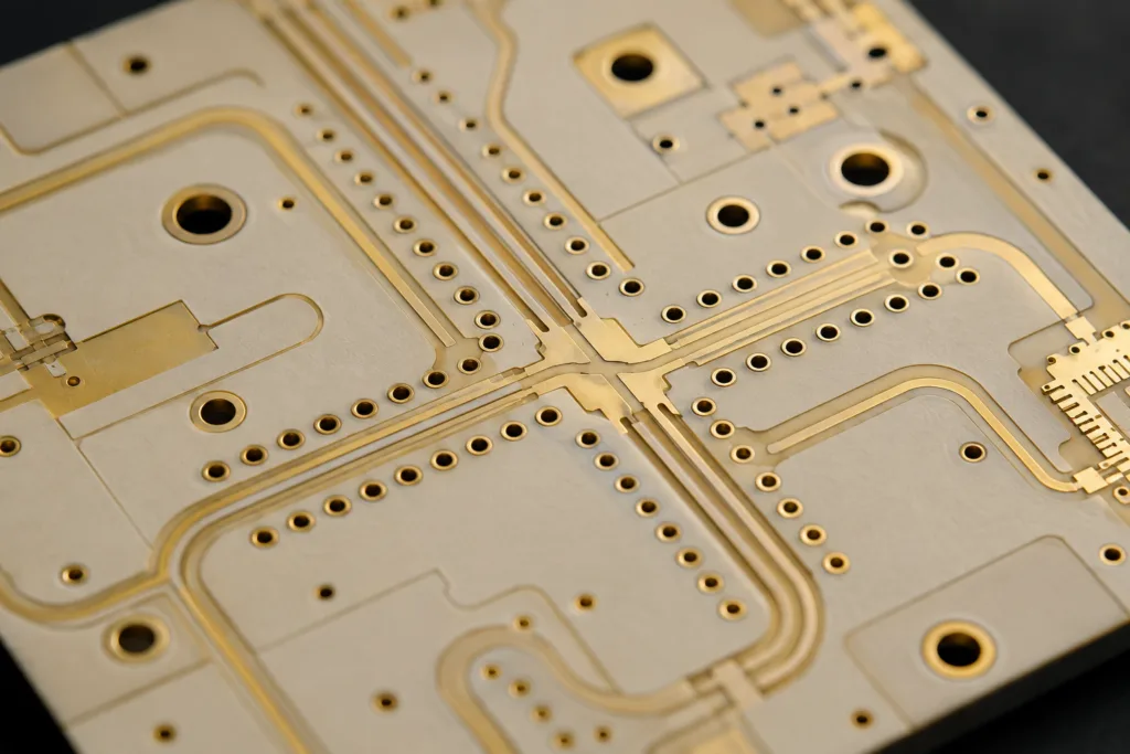 High frequency PCB with gold RF traces and via fences