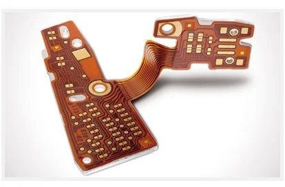 Orange flexible printed circuit with branching sections, copper traces, pads, and small components